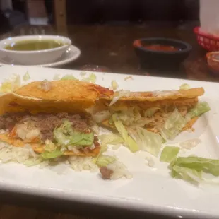 3 hard tacos, I will not finish eating. Have no taste or flavor. I ate one because I added lots of hot sauce and salt, not worth the $.