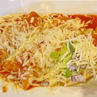 Combo with chicken enchilada, burrito and chalupa.