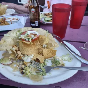 Taco salad that was filled mostly with chips inside the taco bowl.... Not much meat or salad...