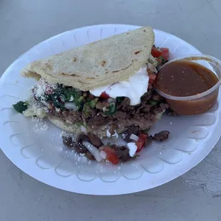 Hand pressed gordita with red chile