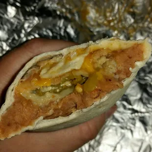 Chile Relleno burrito, in the process of joining the party in my tummy.