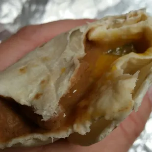 Inside look at the bean and cheese with green! I'm dying for another.