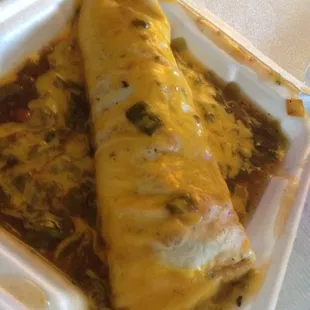 Carne asana burrito with pico smothered in green chile