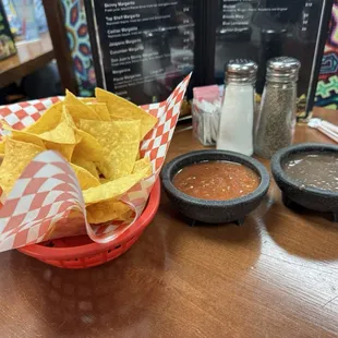 Complex salsa with a nice pepper taste with depth and heat, along with a yummy black bean dip. Both are complimentary with meals.