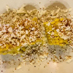 Elote Mexicano (3): Roasted Corn with Mayo, Queso Fresco and Chill Powder.