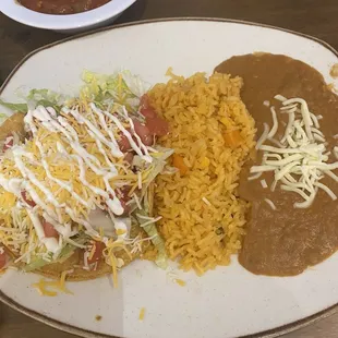 Beef Tostada, rice, and beans.