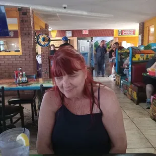 My Mother in Law enjoying herself at dinner.