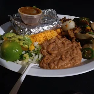 Hers - Steak Mexicana.. Mine - Menudo again (not pictured because I posted Menudo Sunday)