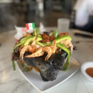 Molcajete Combo is a must to share. This is the order for 2.