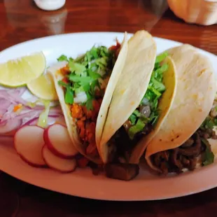 3 Tacos: 1 Carne Molida / Ground Beef 1 Asada / Steak and 1 Pollo con Cilantro y Cebolla / Chicken with Cilantro and Onion