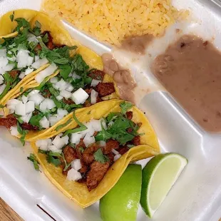 Pastor tacos- beans and rice