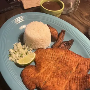 Breaded Fried Chicken Breast with white rice, black beans, and sweet plantains