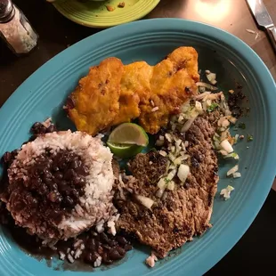 Palomilla Steal with rice beans and tostones