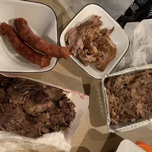 Chorizo, carnitas, lamb, barbacoa (prepping for dinner)