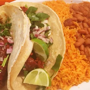 Chorizo Tacos w/cilantro and onion; rice &amp; beans