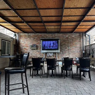 Patio seating, two large big screens