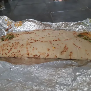 a tortilla wrapped in foil