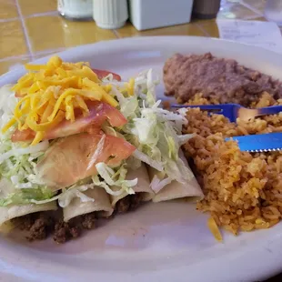 4 tacos with beans &amp; rice meal.