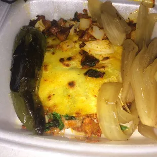 a meal in a styrofoam container