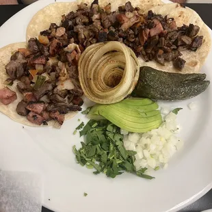 Fajitas tacos. My husband devoured it. And there were limes to give it a sweet sour taste as desired.