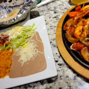 Grilled Shrimp Fajita , Spanish Rice, Refried Beans,