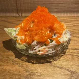 Volcano Salad: lettuce, cucumber, kani, creamy dressing loaded with tobiko