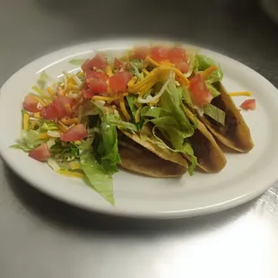 a plate of tacos