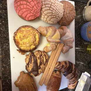 Concha, churros, chocolate croissants, cinnamon pastries, adorable little pig that was cinnamon flavored, a coconut pastry