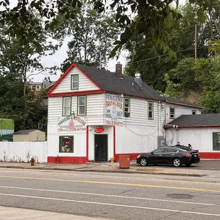 a car parked in front of a building