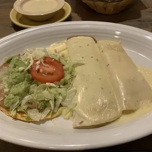 Vegetarian #1: Taco (tostada), cheese enchilada, and refried bean burrito