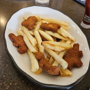 Chicken nuggets and fries, kids&apos; menu