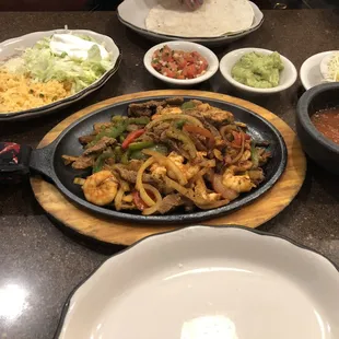 a variety of mexican food on a table