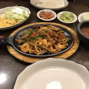 a variety of mexican food on a table