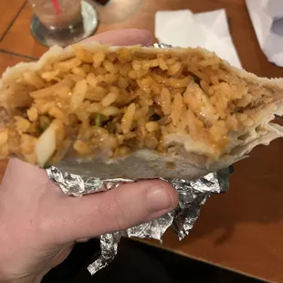 Chicken burrito - but with 1 piece of chicken.. This place has really gone down hill.