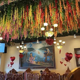 Beautifully decorated ceiling and balloons left from Valentine's Day.