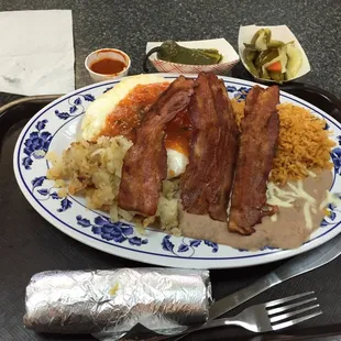 Huevos rancheros with bacon.  All of this for $6.70!!!