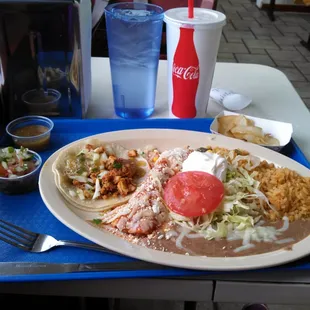 Combo # 1, taco and enchilada plate, with a side of horchata