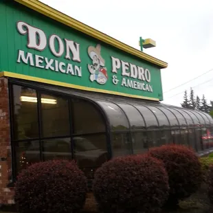 A quick picture as I wait to pull into traffic with my take-out in the passenger seat and my mouth watering.