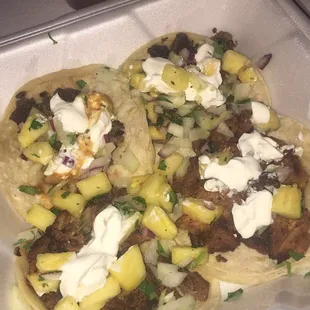 Pork tacos - added on pineapple salsa and sour cream