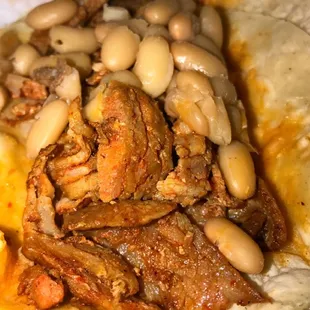 a chicken taco with beans