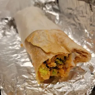 Spicy shrimp and asada burrito I added beans to it delicious! As always