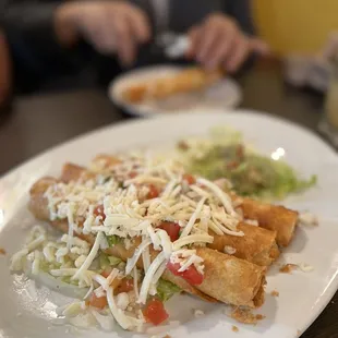 Flautas half chicken half beef surprisingly very good definitely recommend trying