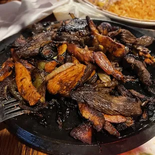 Fajitas were literally served burnt!