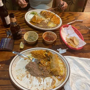Carne asada taco + pulled pork enchilada. EXCELLENT.