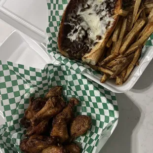 Lemon pepper wings. Philly cheese steak and fresh cut fries.