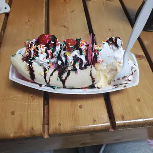 a banana split with ice cream and sprinkles