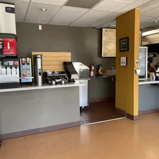 Inside: view as you walk in of the soda machine and order counter