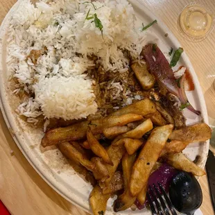Kinda deceiving with most of the lomo saltado dish being rice and fries.