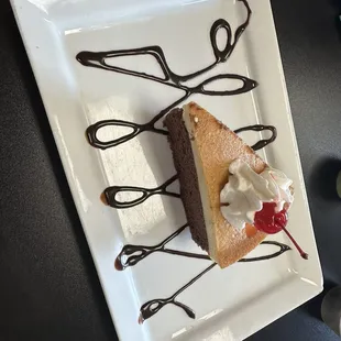 Flan on chocolate cake.