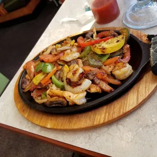 Fajitas with chicken,shrimp and steak